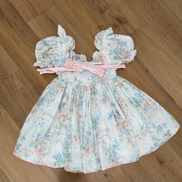 Selkie Dresses & Skirts - Selkie Pastel Floral Ruffle Dress with Pink Waist Tie